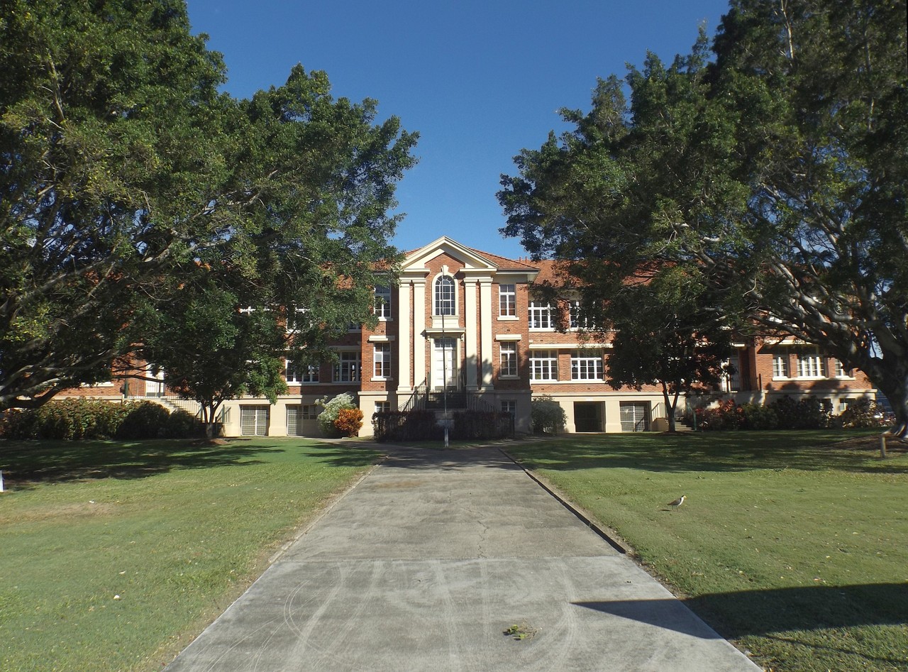 Stafford, QLD, Brick building surrounded by large trees