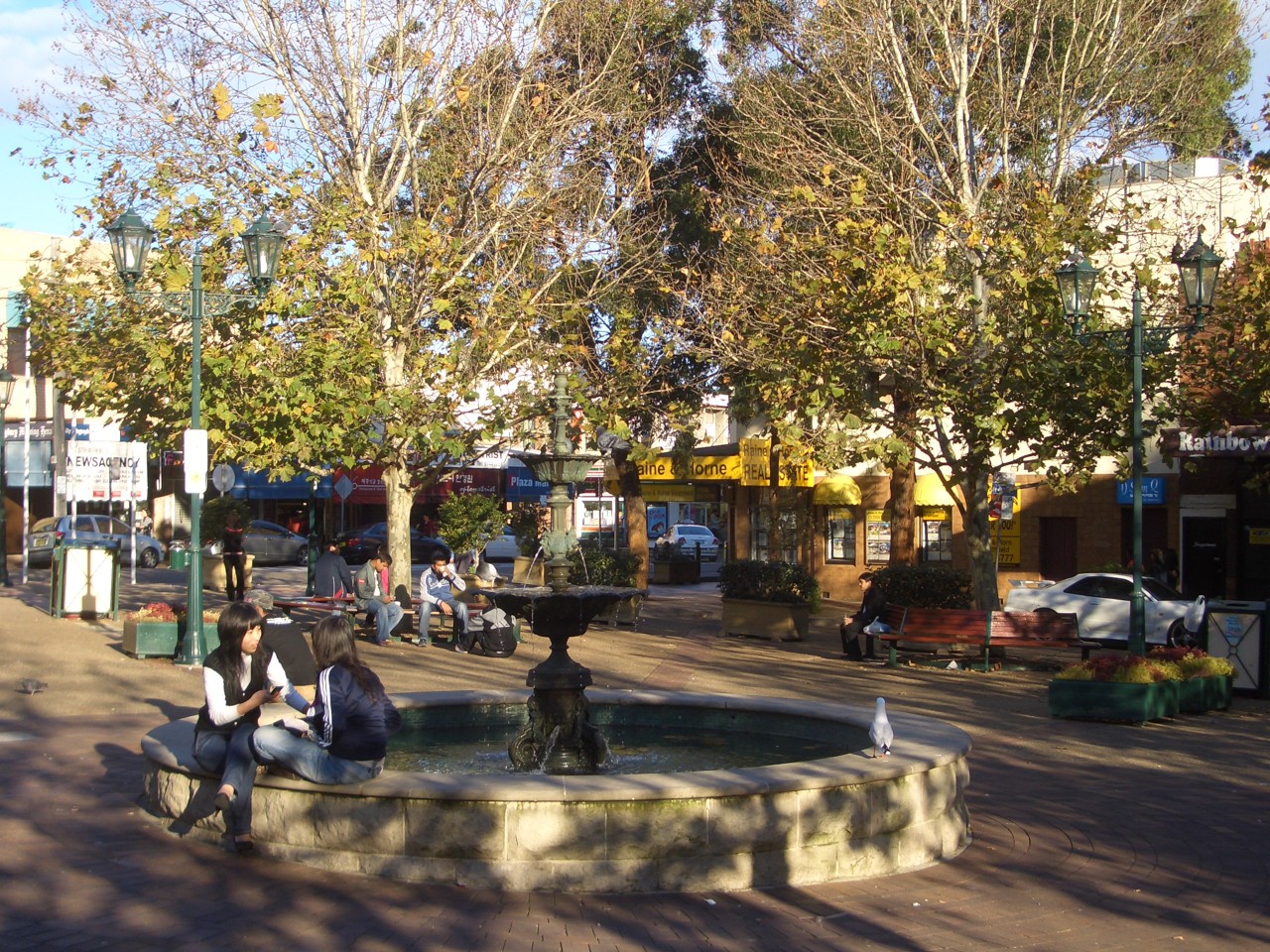 Strathfield, NSW, People sitting around a public fountain