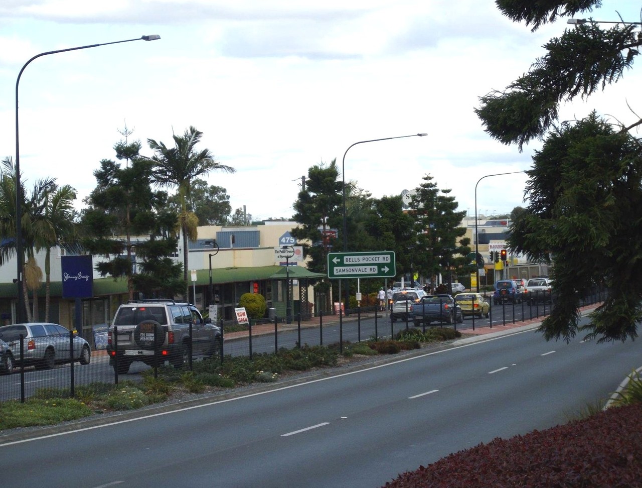 Strathpine, QLD, Main road with shops and traffic signs