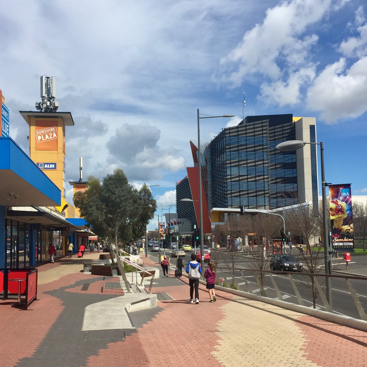 Sunshine, VIC, Shopping plaza with nearby modern office building