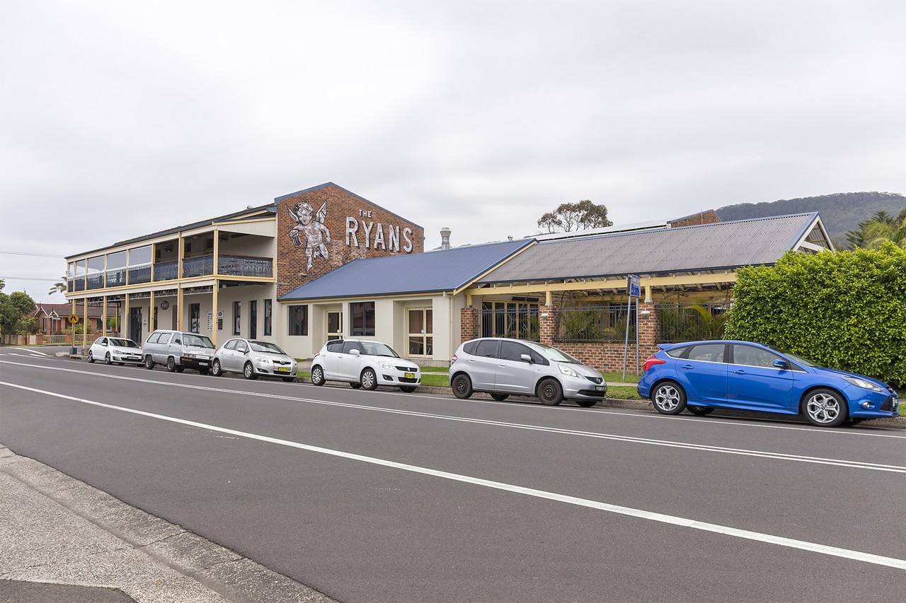Thirroul, NSW, Street view of Ryans Hotel with parked cars