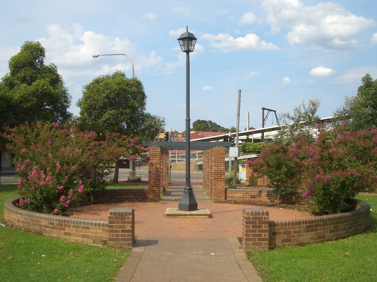 Toongabbie, NSW, Lamp post in a circular brick park