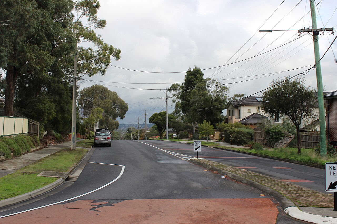 Vermont South, VIC, Residential street with houses and parked car