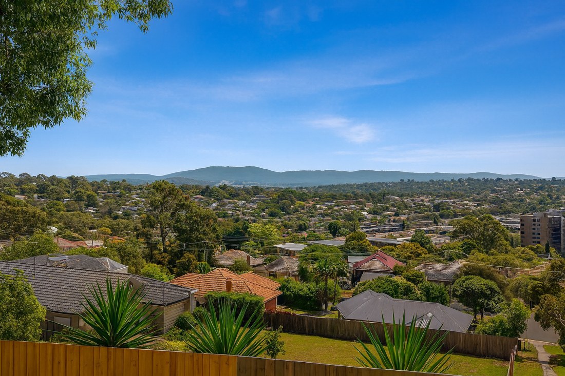 Vermont, VIC, Suburban houses with distant hills in background