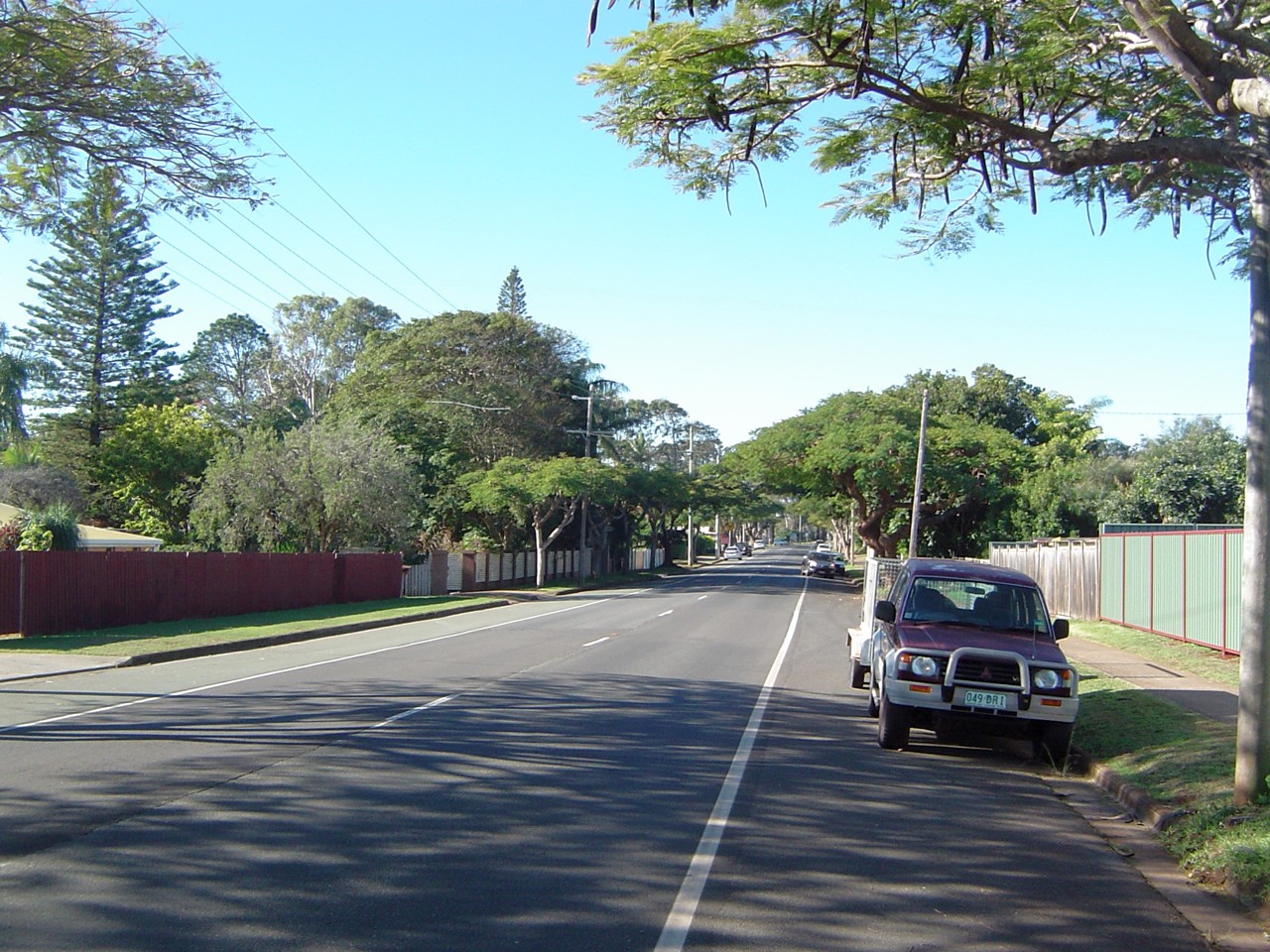 Victoria Point, QLD, Quiet residential street with parked car