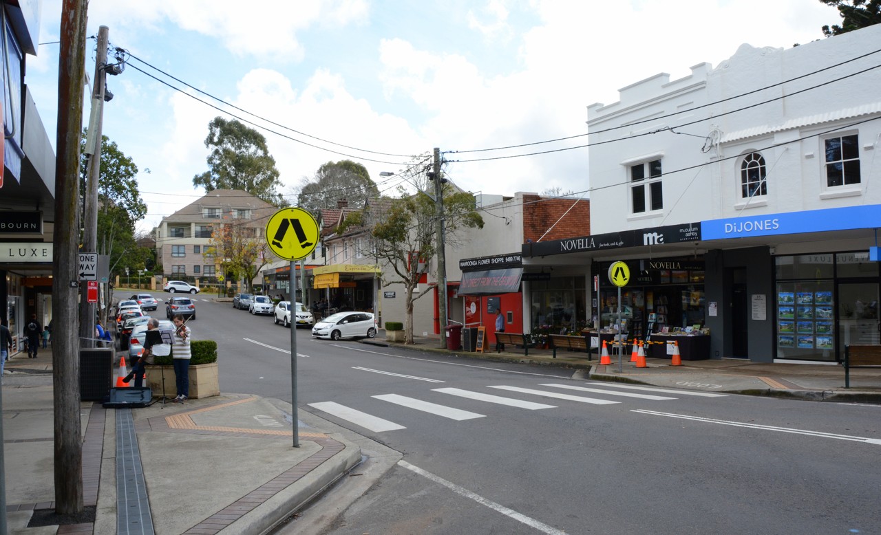 Wahroonga, NSW, Small shops and cafes along a curved street