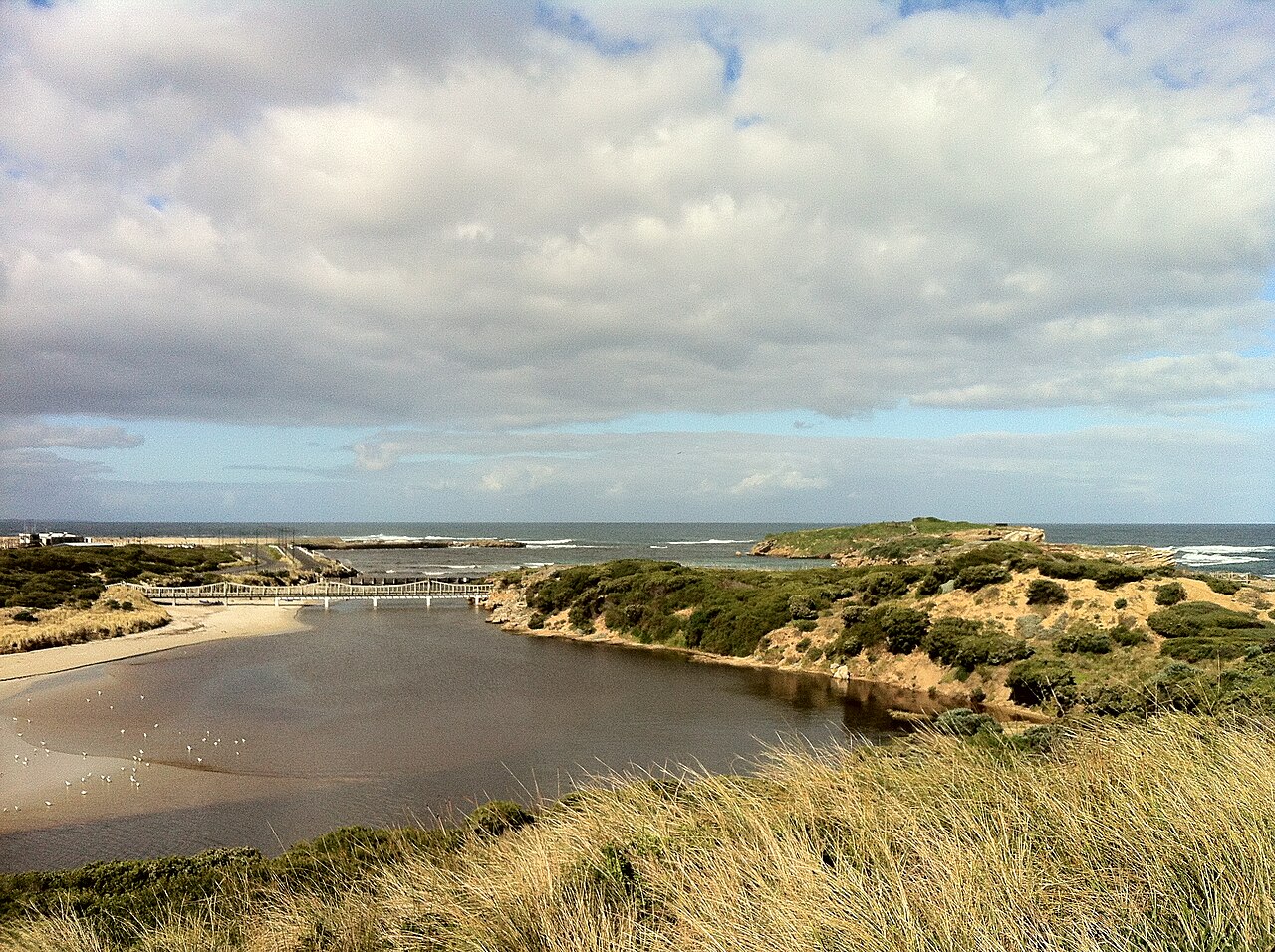Warrnambool, VIC — Merri River mouth opening to the ocean