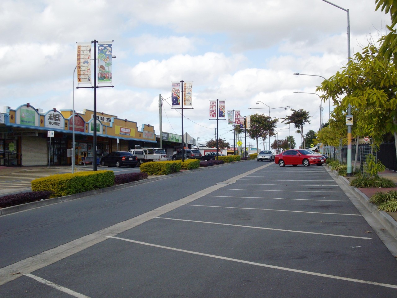 Woodridge, QLD, Parking spaces and shops on quiet street