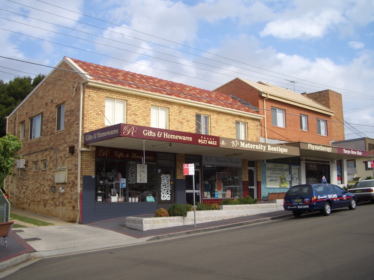 Woolooware, NSW — Two-storey shops on a suburban street
