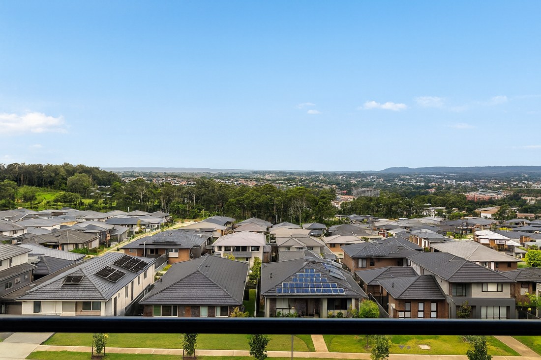 Woongarrah, NSW, Suburban houses with solar panels and greenery