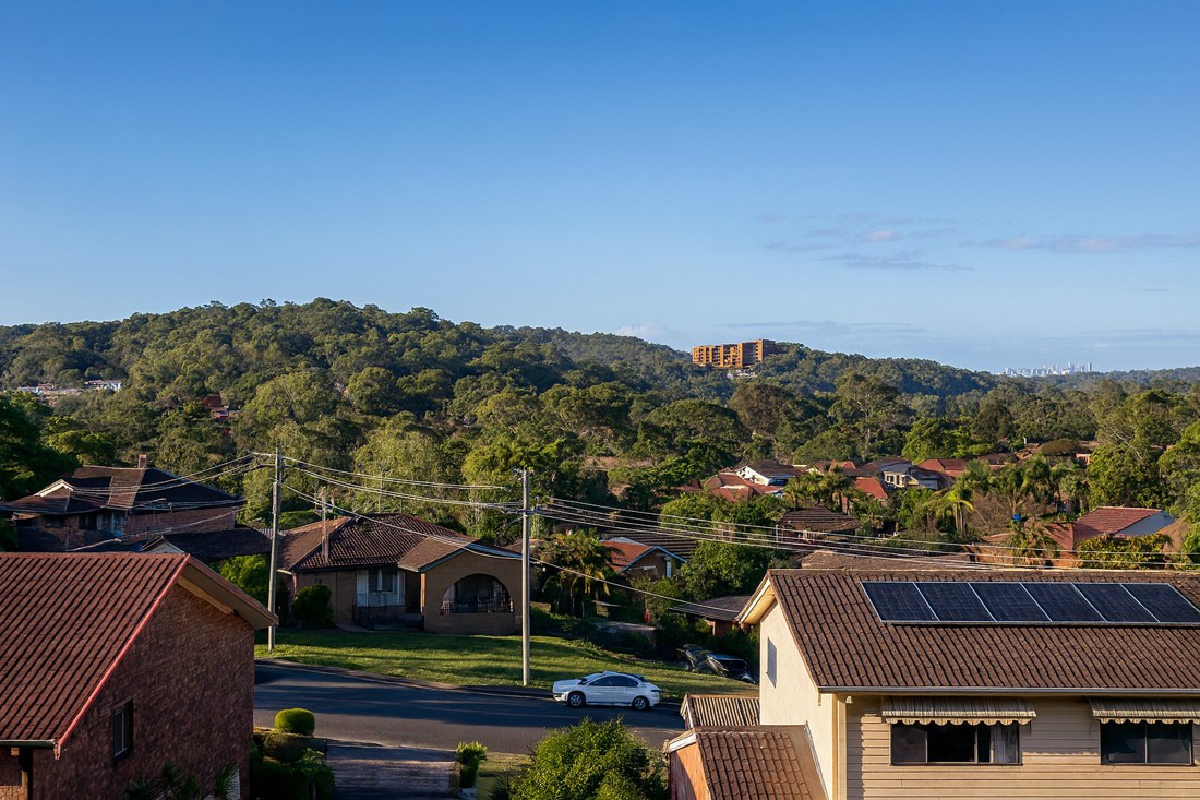 Wyoming, NSW, Residential area with houses and surrounding bushland