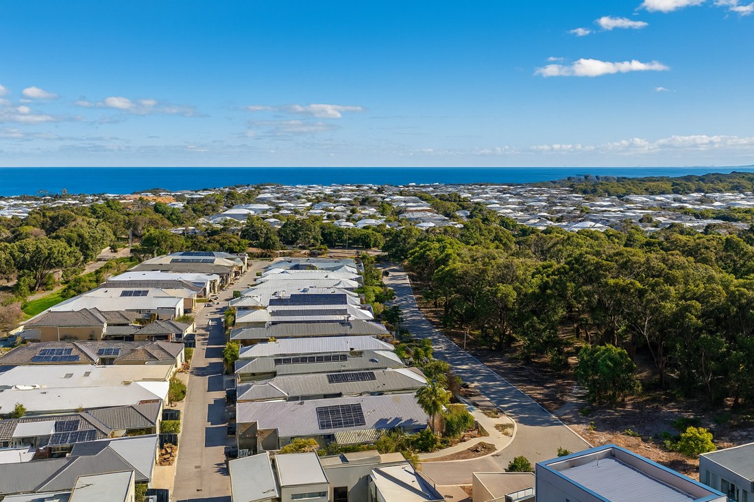Yanchep, WA, Residential suburb with ocean in background