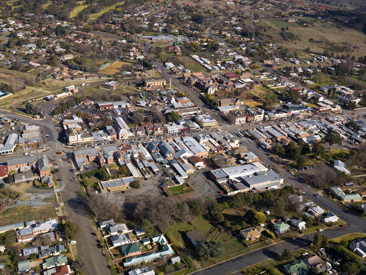 Yass, NSW, Aerial view of a town with houses and shops