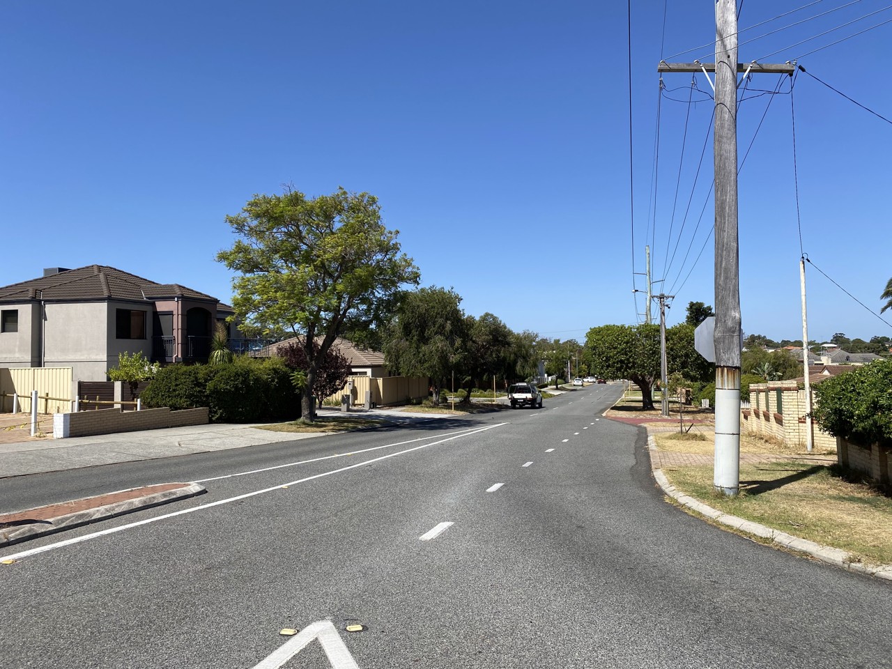 Yokine, WA, Suburban street with houses and powerlines