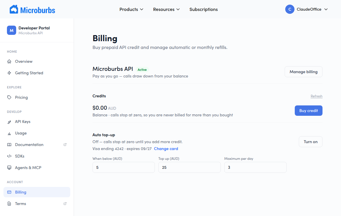 The Microburbs developer portal billing page, showing prepaid credit, automatic refill settings and a daily spend limit.