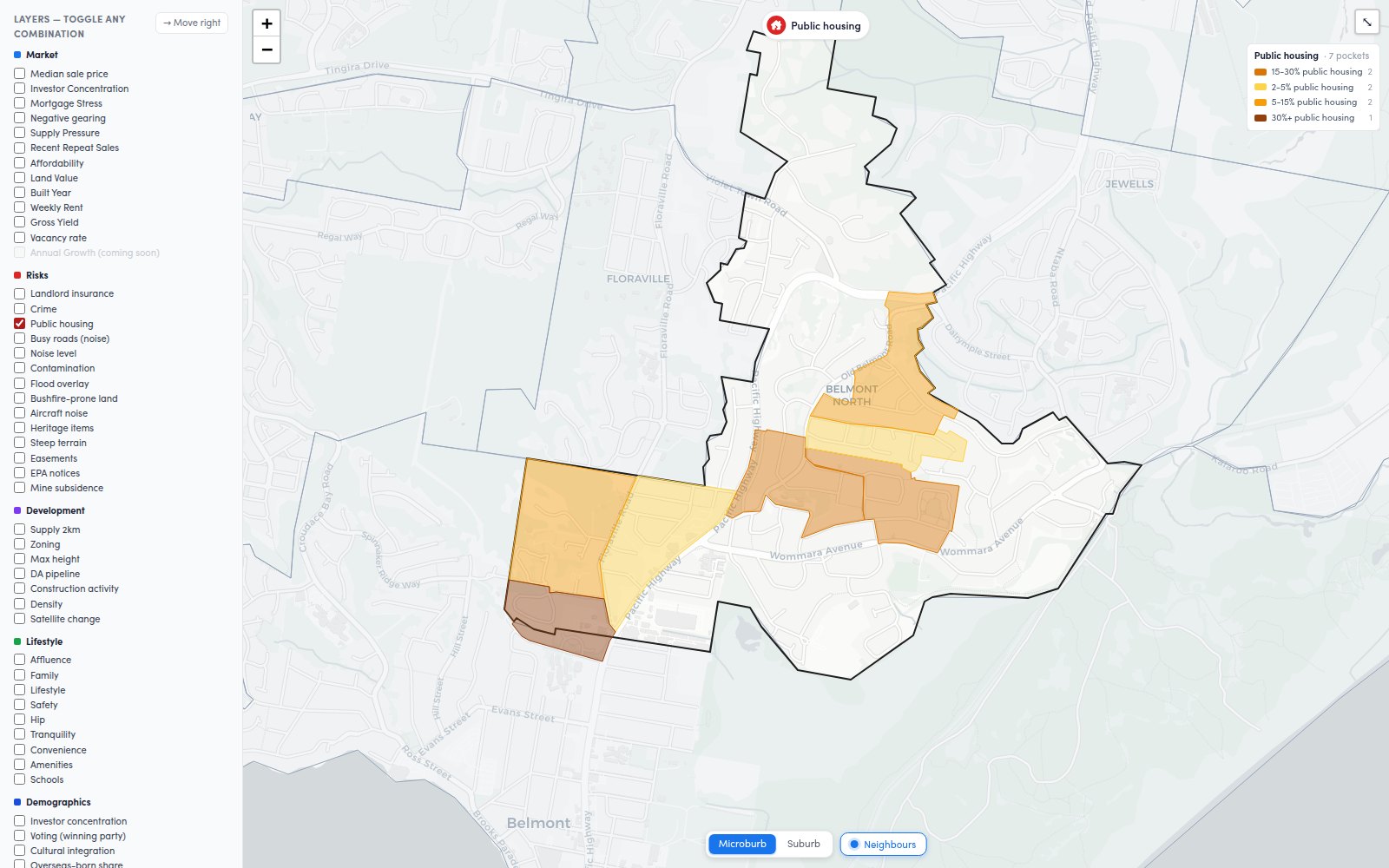 The Microburbs map explorer coloured by public housing, showing seven separately shaded pockets in Belmont North