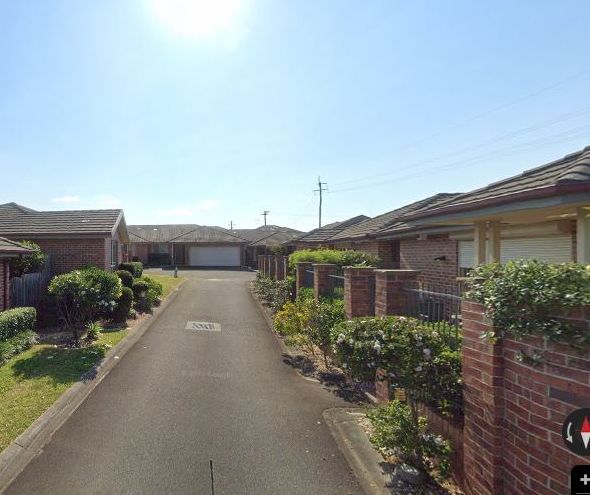 Mountbatten St, Corrimal from the kerb